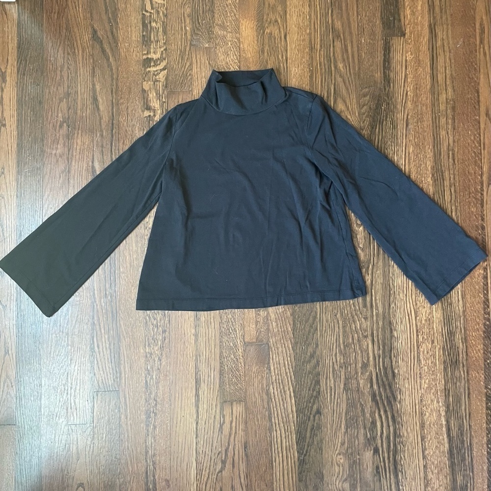 Madewell black turtleneck with flare sleeves